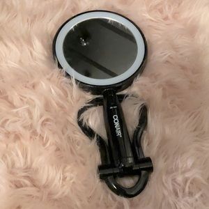 Conair double sided magnifying mirror with light